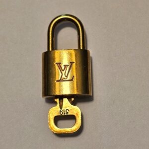 Louis Vuitton Brass Lock #319